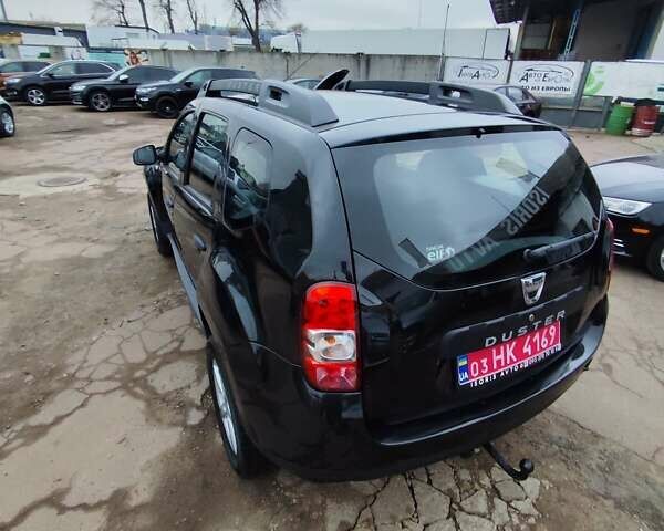 Черный Дачия Duster, объемом двигателя 1.6 л и пробегом 174 тыс. км за 9999 $, фото 14 на Automoto.ua