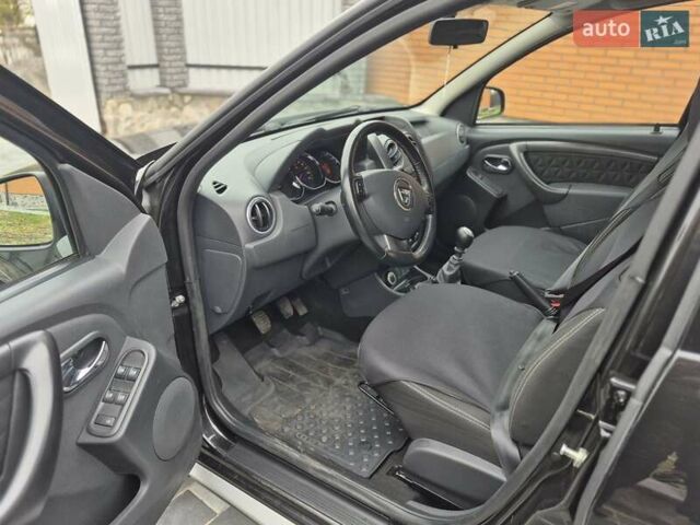 Чорний Дачія Duster, об'ємом двигуна 1.6 л та пробігом 71 тис. км за 11750 $, фото 13 на Automoto.ua