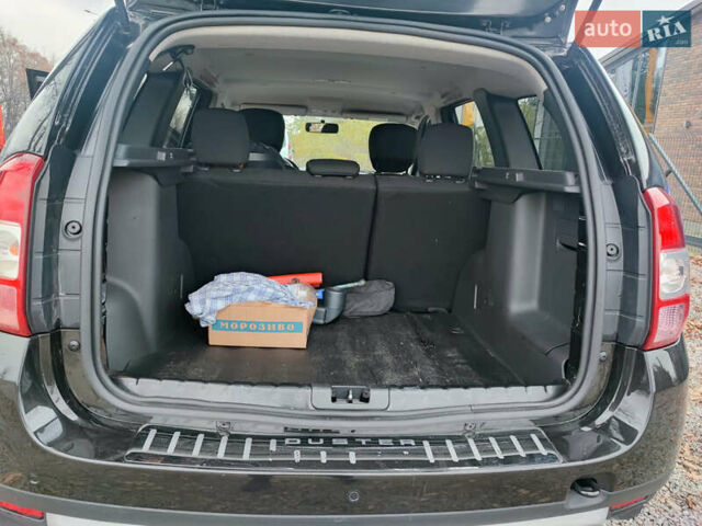 Черный Дачия Duster, объемом двигателя 1.2 л и пробегом 162 тыс. км за 9999 $, фото 6 на Automoto.ua