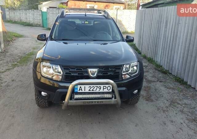 Черный Дачия Duster, объемом двигателя 1.2 л и пробегом 106 тыс. км за 12000 $, фото 1 на Automoto.ua