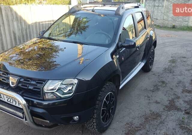 Черный Дачия Duster, объемом двигателя 1.2 л и пробегом 106 тыс. км за 12000 $, фото 2 на Automoto.ua