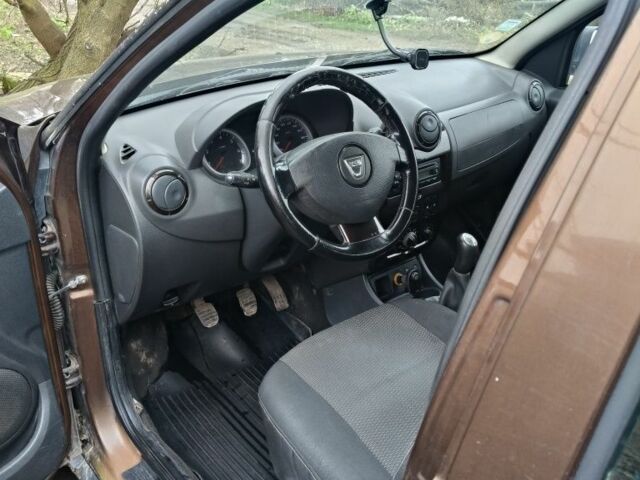 Коричневый Дачия Duster, объемом двигателя 1.5 л и пробегом 230 тыс. км за 8600 $, фото 6 на Automoto.ua
