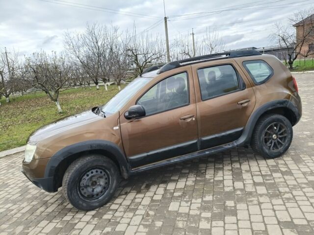 Коричневый Дачия Duster, объемом двигателя 1.5 л и пробегом 230 тыс. км за 8600 $, фото 2 на Automoto.ua