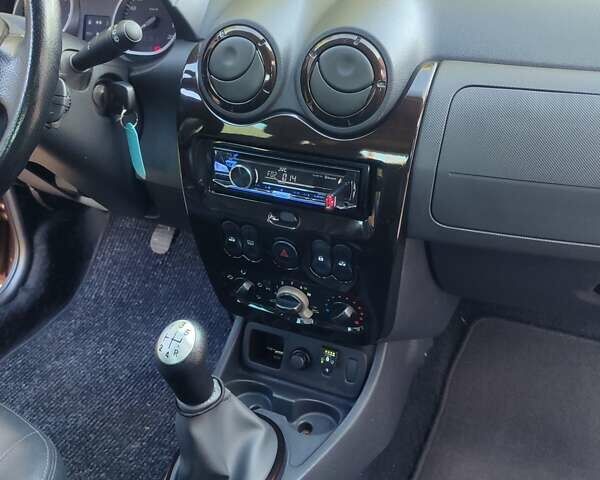 Коричневый Дачия Duster, объемом двигателя 1.6 л и пробегом 162 тыс. км за 9400 $, фото 12 на Automoto.ua