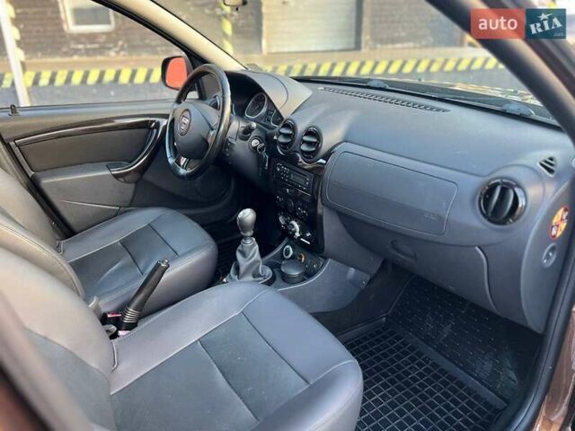 Коричневый Дачия Duster, объемом двигателя 1.46 л и пробегом 187 тыс. км за 8800 $, фото 37 на Automoto.ua