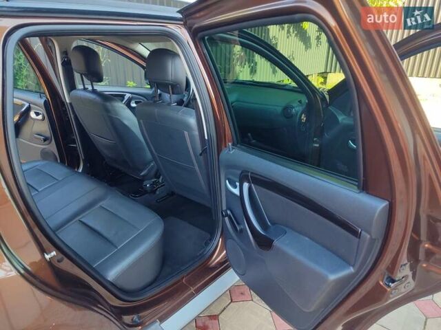 Коричневый Дачия Duster, объемом двигателя 1.6 л и пробегом 162 тыс. км за 9400 $, фото 9 на Automoto.ua