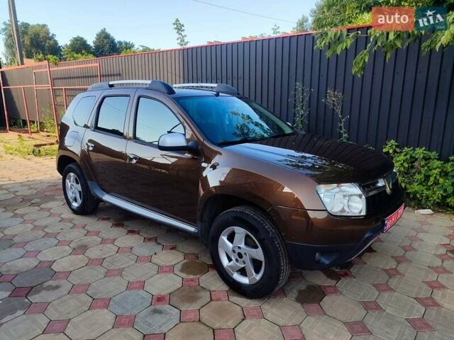 Коричневый Дачия Duster, объемом двигателя 1.6 л и пробегом 162 тыс. км за 9400 $, фото 2 на Automoto.ua