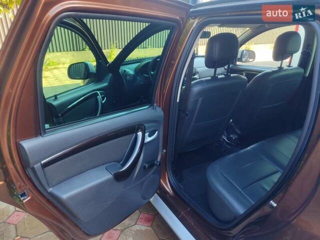 Коричневый Дачия Duster, объемом двигателя 1.6 л и пробегом 162 тыс. км за 9400 $, фото 3 на Automoto.ua
