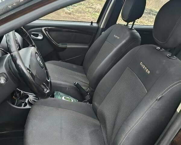 Коричневый Дачия Duster, объемом двигателя 1.5 л и пробегом 230 тыс. км за 8600 $, фото 6 на Automoto.ua