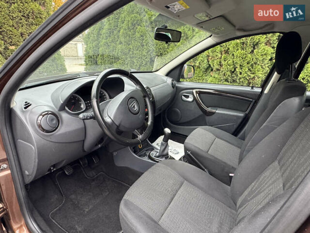 Коричневый Дачия Duster, объемом двигателя 1.6 л и пробегом 170 тыс. км за 8750 $, фото 16 на Automoto.ua