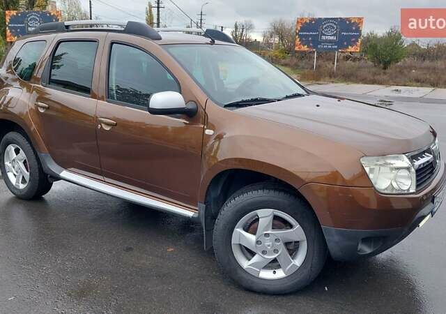 Коричневый Дачия Duster, объемом двигателя 1.6 л и пробегом 225 тыс. км за 7900 $, фото 5 на Automoto.ua