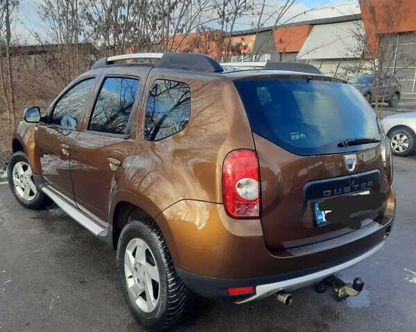 Коричневый Дачия Duster, объемом двигателя 1.6 л и пробегом 111 тыс. км за 9500 $, фото 4 на Automoto.ua