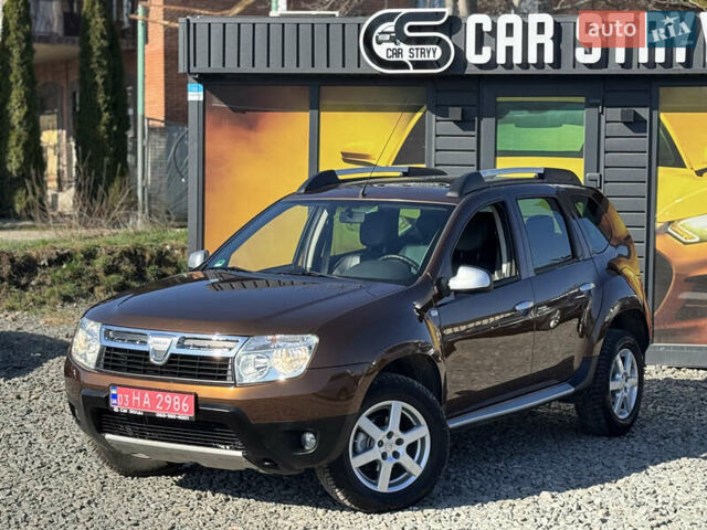 Коричневый Дачия Duster, объемом двигателя 1.6 л и пробегом 167 тыс. км за 8999 $, фото 2 на Automoto.ua