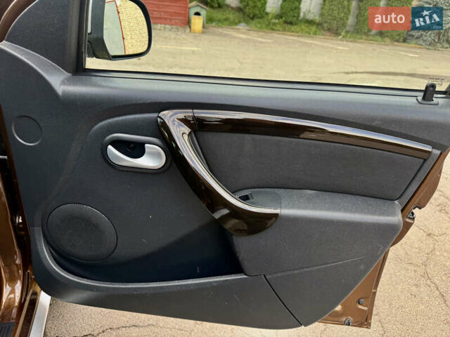 Коричневий Дачія Duster, об'ємом двигуна 1.6 л та пробігом 196 тис. км за 7399 $, фото 24 на Automoto.ua