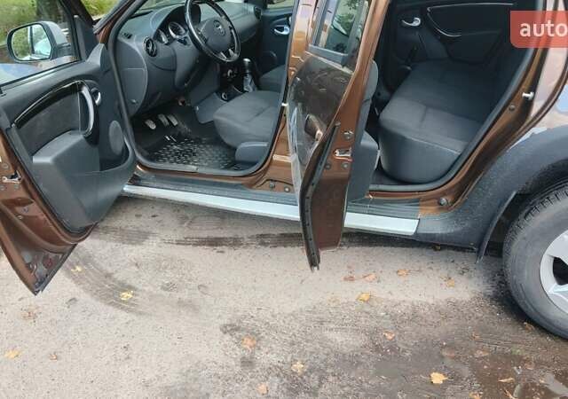Коричневый Дачия Duster, объемом двигателя 1.5 л и пробегом 302 тыс. км за 9200 $, фото 7 на Automoto.ua
