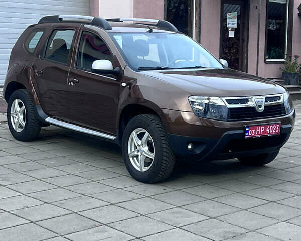 Коричневий Дачія Duster, об'ємом двигуна 1.6 л та пробігом 155 тис. км за 9600 $, фото 1 на Automoto.ua