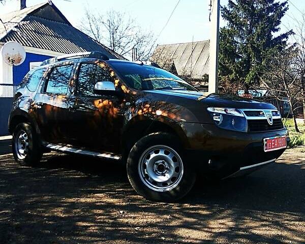 Коричневый Дачия Duster, объемом двигателя 1.6 л и пробегом 196 тыс. км за 9600 $, фото 24 на Automoto.ua