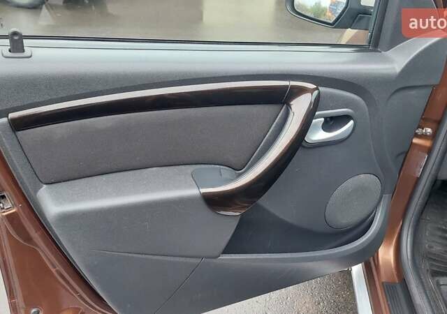 Коричневый Дачия Duster, объемом двигателя 1.6 л и пробегом 225 тыс. км за 7900 $, фото 13 на Automoto.ua
