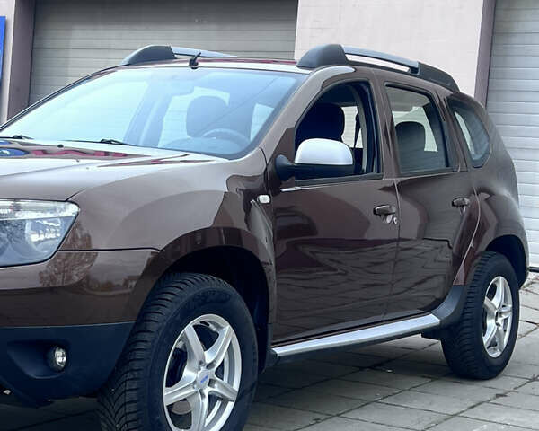 Коричневий Дачія Duster, об'ємом двигуна 1.6 л та пробігом 155 тис. км за 9600 $, фото 6 на Automoto.ua