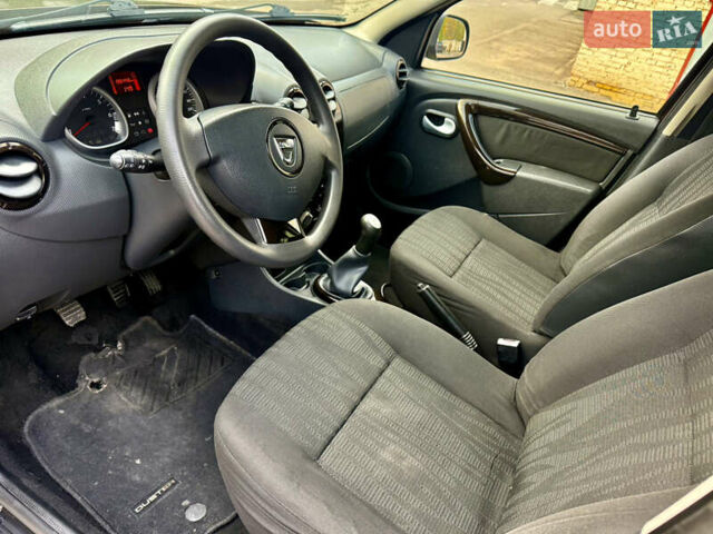 Коричневий Дачія Duster, об'ємом двигуна 1.6 л та пробігом 196 тис. км за 7799 $, фото 13 на Automoto.ua