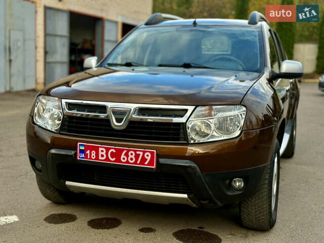 Коричневий Дачія Duster, об'ємом двигуна 1.6 л та пробігом 196 тис. км за 6999 $, фото 1 на Automoto.ua