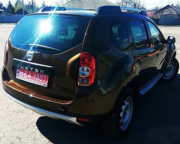 Коричневый Дачия Duster, объемом двигателя 1.6 л и пробегом 196 тыс. км за 9600 $, фото 4 на Automoto.ua