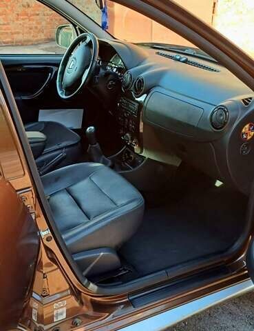 Коричневый Дачия Duster, объемом двигателя 1.6 л и пробегом 111 тыс. км за 9500 $, фото 16 на Automoto.ua