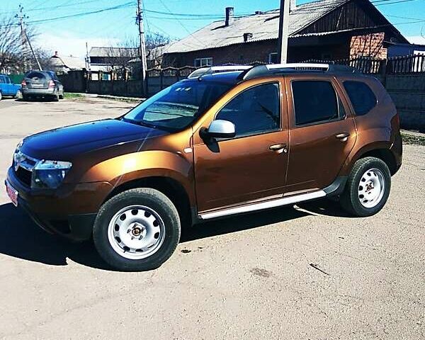 Коричневый Дачия Duster, объемом двигателя 1.6 л и пробегом 196 тыс. км за 9600 $, фото 2 на Automoto.ua