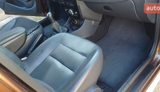 Коричневый Дачия Duster, объемом двигателя 1.6 л и пробегом 111 тыс. км за 9500 $, фото 8 на Automoto.ua