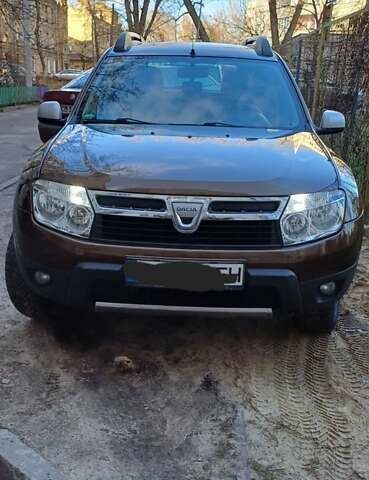 Коричневый Дачия Duster, объемом двигателя 1.6 л и пробегом 111 тыс. км за 9500 $, фото 2 на Automoto.ua