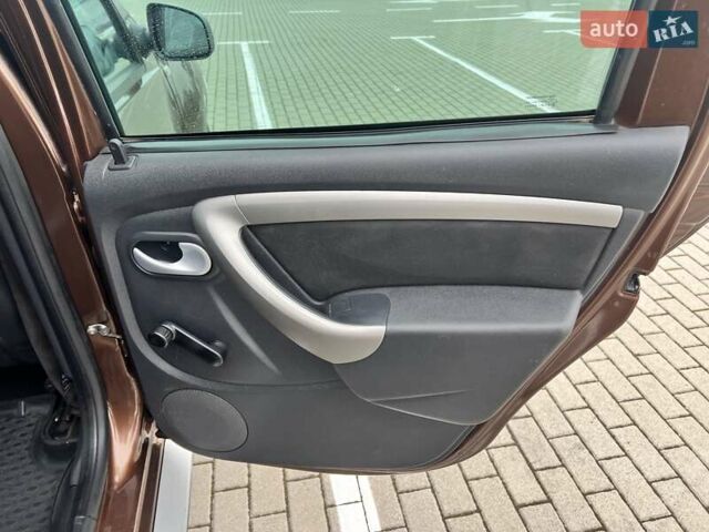 Коричневый Дачия Duster, объемом двигателя 1.5 л и пробегом 242 тыс. км за 7950 $, фото 44 на Automoto.ua