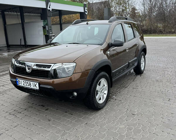 Коричневий Дачія Duster, об'ємом двигуна 1.6 л та пробігом 183 тис. км за 10499 $, фото 1 на Automoto.ua