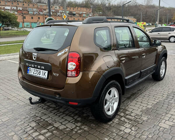 Коричневий Дачія Duster, об'ємом двигуна 1.6 л та пробігом 183 тис. км за 10499 $, фото 3 на Automoto.ua