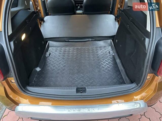 Желтый Дачия Duster, объемом двигателя 1.6 л и пробегом 165 тыс. км за 12900 $, фото 37 на Automoto.ua