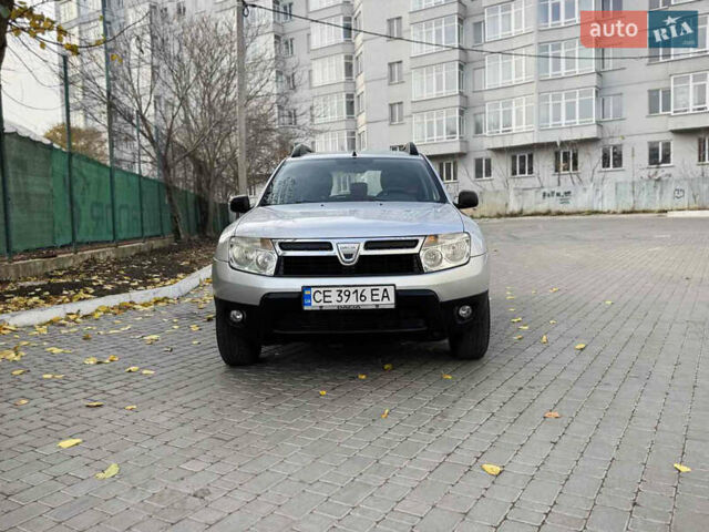 Серый Дачия Duster, объемом двигателя 1.6 л и пробегом 107 тыс. км за 7300 $, фото 1 на Automoto.ua
