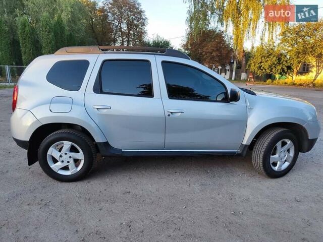 Серый Дачия Duster, объемом двигателя 1.6 л и пробегом 130 тыс. км за 8400 $, фото 7 на Automoto.ua