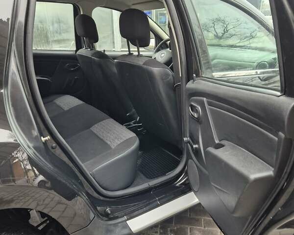 Серый Дачия Duster, объемом двигателя 1.6 л и пробегом 220 тыс. км за 8999 $, фото 4 на Automoto.ua