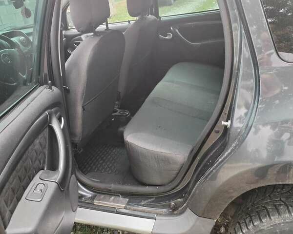 Серый Дачия Duster, объемом двигателя 1.5 л и пробегом 153 тыс. км за 9300 $, фото 5 на Automoto.ua