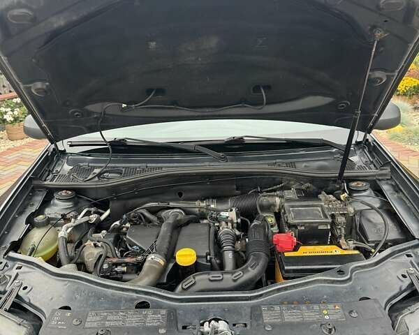 Серый Дачия Duster, объемом двигателя 1.46 л и пробегом 201 тыс. км за 9500 $, фото 12 на Automoto.ua