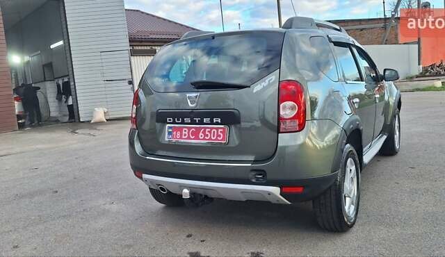 Дачия Duster 2013 в Новоархангельске на Automoto.ua Зеленый Дачия Duster, объемом двигателя 1.5 л и пробегом 198 тыс. км за 10500 $, фото 36 на Automoto.ua