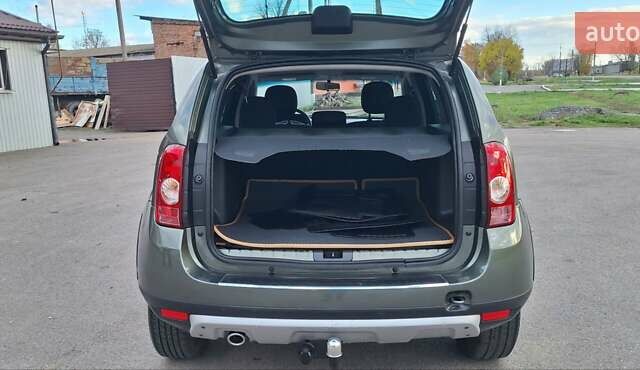 Дачия Duster 2013 в Новоархангельске на Automoto.ua Зеленый Дачия Duster, объемом двигателя 1.5 л и пробегом 198 тыс. км за 10500 $, фото 17 на Automoto.ua