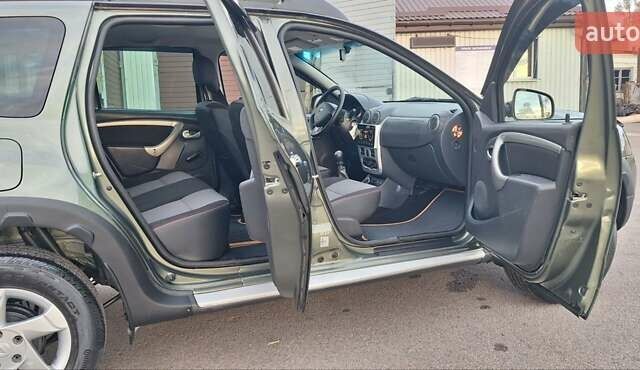 Дачия Duster 2013 в Новоархангельске на Automoto.ua Зеленый Дачия Duster, объемом двигателя 1.5 л и пробегом 198 тыс. км за 10500 $, фото 87 на Automoto.ua