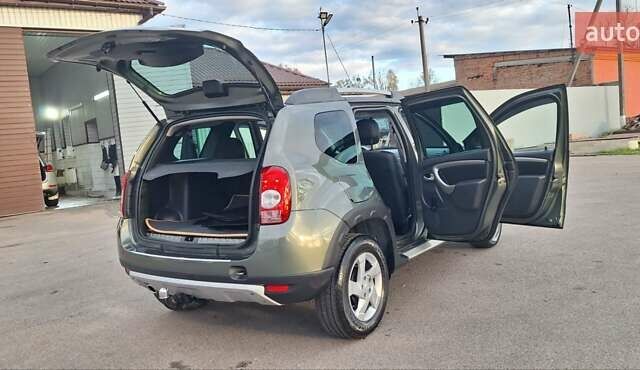 Дачия Duster 2013 в Новоархангельске на Automoto.ua Зеленый Дачия Duster, объемом двигателя 1.5 л и пробегом 198 тыс. км за 10500 $, фото 95 на Automoto.ua