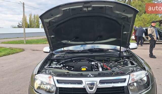 Дачия Duster 2013 в Новоархангельске на Automoto.ua Зеленый Дачия Duster, объемом двигателя 1.5 л и пробегом 198 тыс. км за 10500 $, фото 32 на Automoto.ua