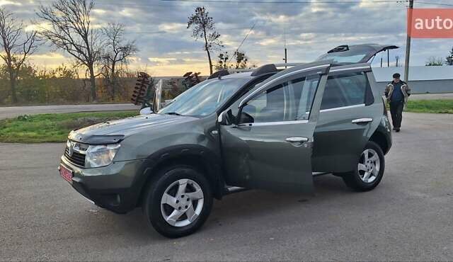 Дачия Duster 2013 в Новоархангельске на Automoto.ua Зеленый Дачия Duster, объемом двигателя 1.5 л и пробегом 198 тыс. км за 10500 $, фото 100 на Automoto.ua