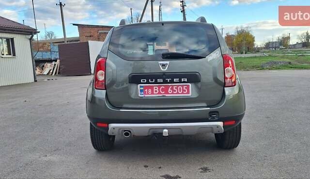 Дачия Duster 2013 в Новоархангельске на Automoto.ua Зеленый Дачия Duster, объемом двигателя 1.5 л и пробегом 198 тыс. км за 10500 $, фото 38 на Automoto.ua