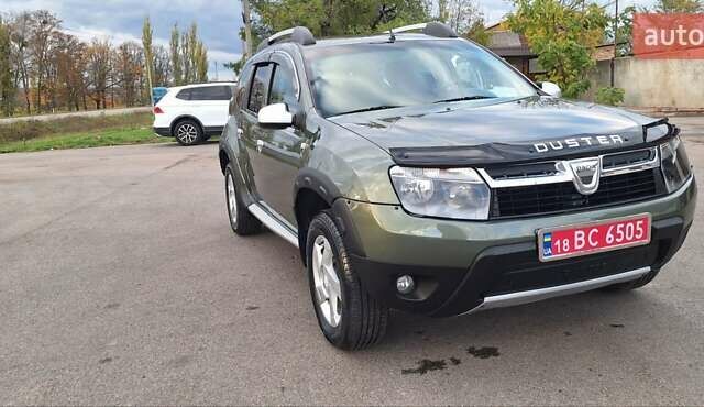 Дачия Duster 2013 в Новоархангельске на Automoto.ua Зеленый Дачия Duster, объемом двигателя 1.5 л и пробегом 198 тыс. км за 10500 $, фото 35 на Automoto.ua