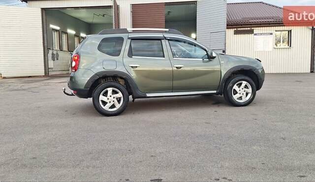 Дачия Duster 2013 в Новоархангельске на Automoto.ua Зеленый Дачия Duster, объемом двигателя 1.5 л и пробегом 198 тыс. км за 10500 $, фото 122 на Automoto.ua