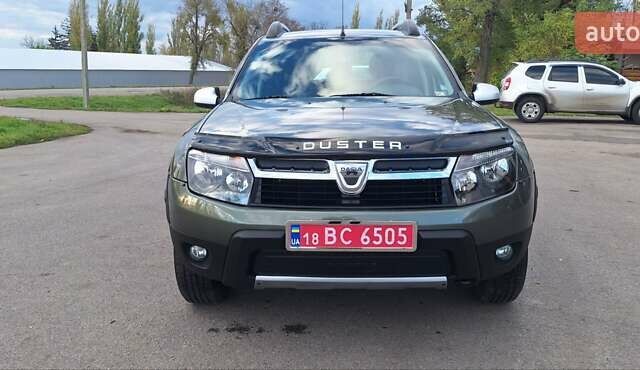 Дачия Duster 2013 в Новоархангельске на Automoto.ua Зеленый Дачия Duster, объемом двигателя 1.5 л и пробегом 198 тыс. км за 10500 $, фото 4 на Automoto.ua