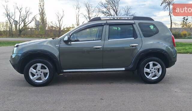 Дачия Duster 2013 в Новоархангельске на Automoto.ua Зеленый Дачия Duster, объемом двигателя 1.5 л и пробегом 198 тыс. км за 10500 $, фото 3 на Automoto.ua